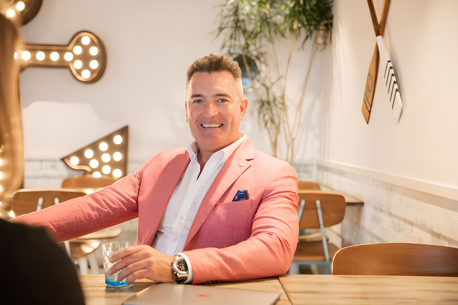 Michael Mahon in a pink jacket
